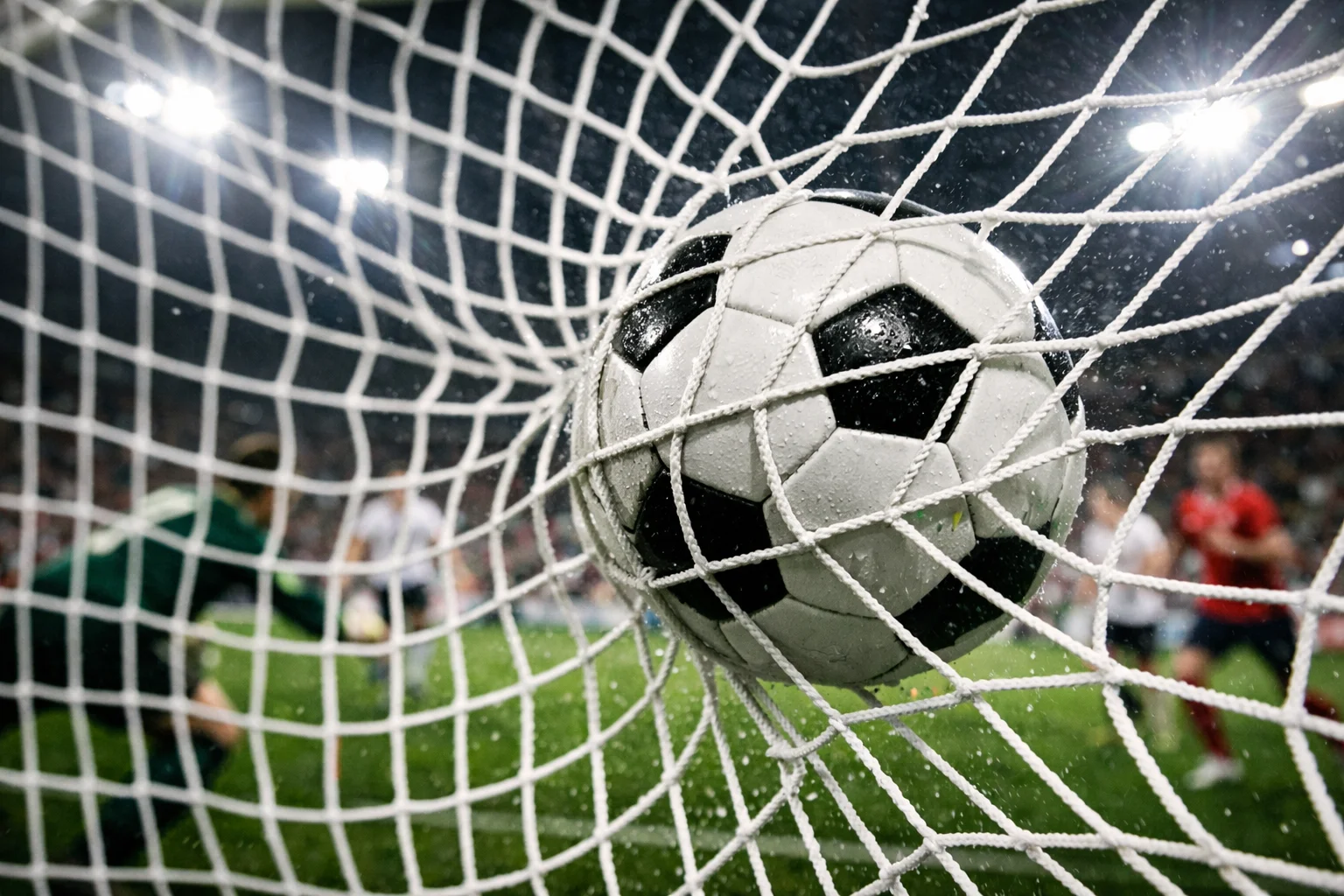 Rete da calcio con pallone durante un gol